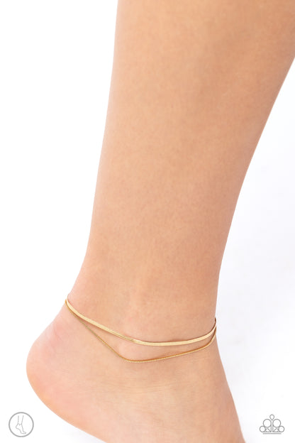 Glistening Gauge Gold Ankle Bracelet Paparazzi